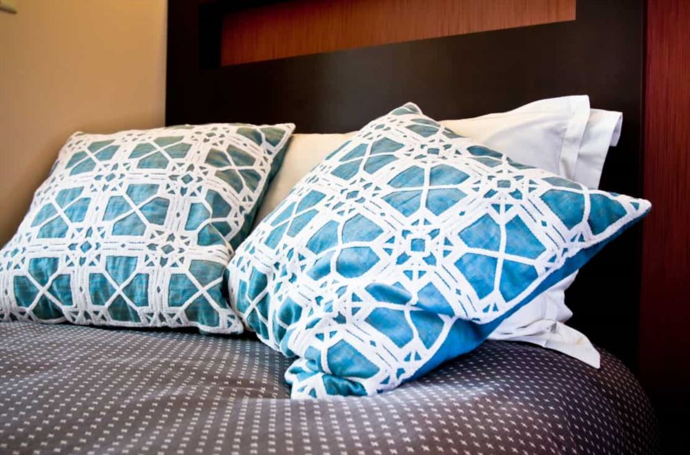 decorative pillows in rehab facility bedroom